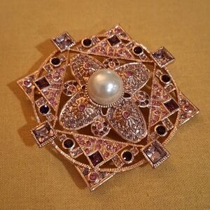 Joan Boyce Gold-Tone Brooch with Pearl and Pink/Purple Stones